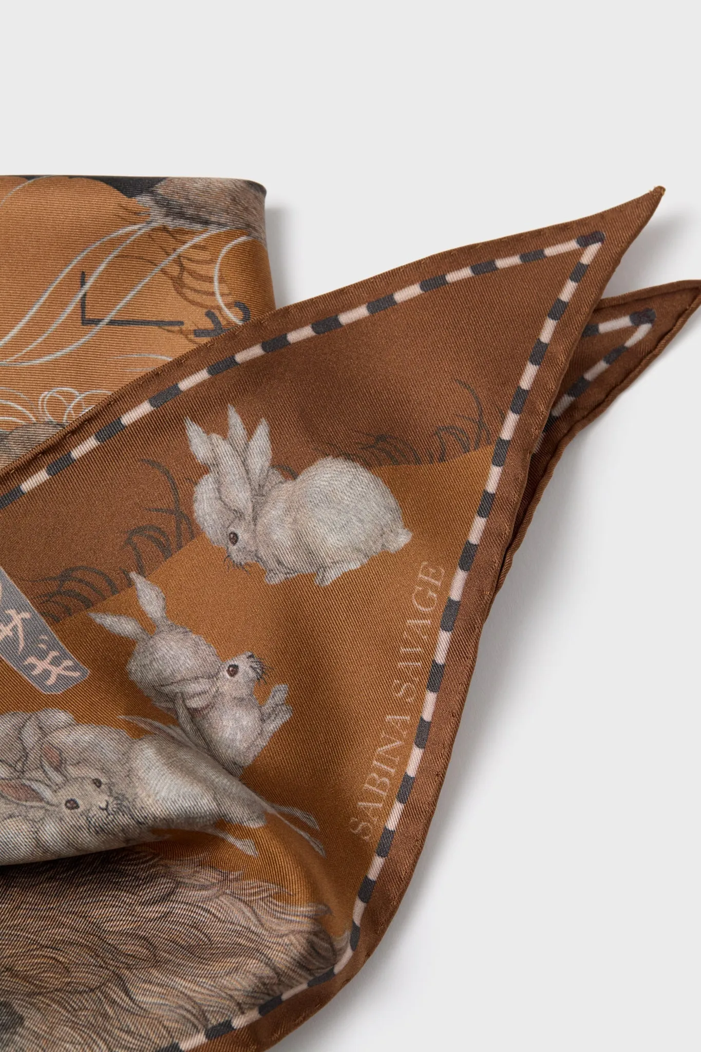 The Floating Rabbits Cinnamon Triangle Scarf